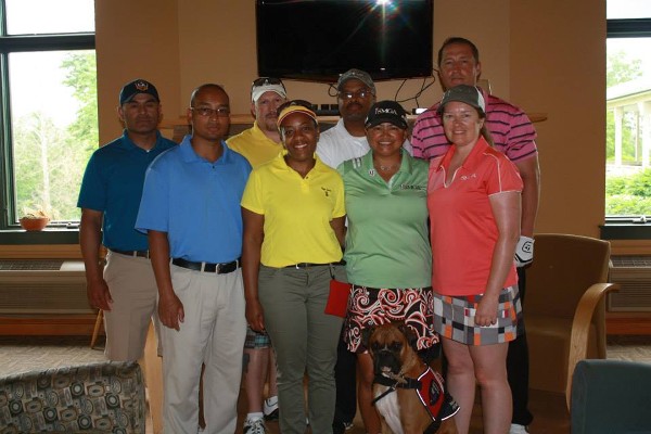 Winners of the Annual AFCEA Belvoir Golf Tournament gather in May. The tournament raised scholarship funds.